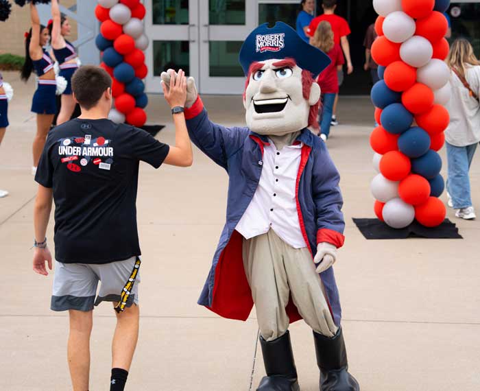 mascot and a student